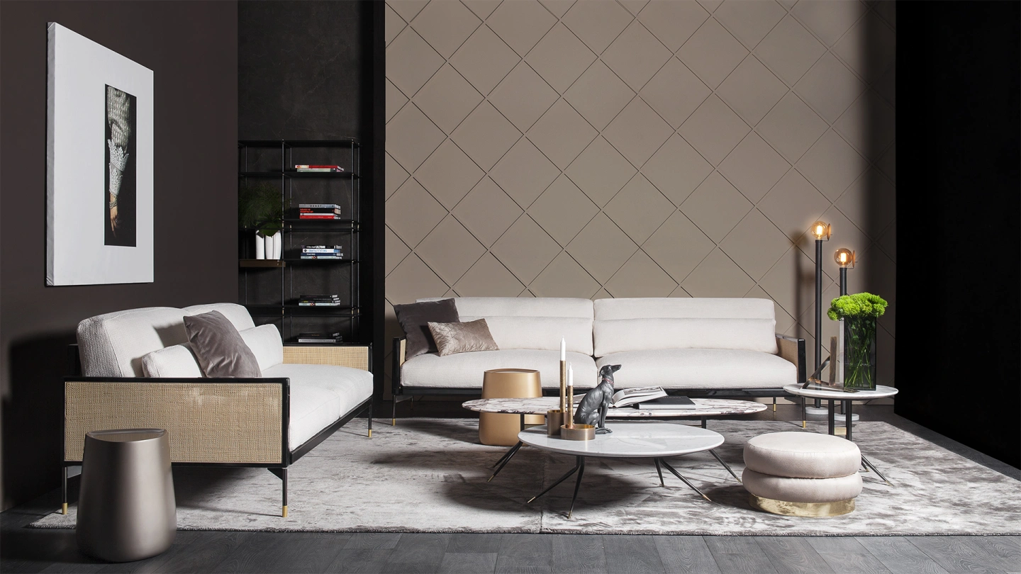 A cozy living room featuring beautiful luxury living room rugs under modern sofas.