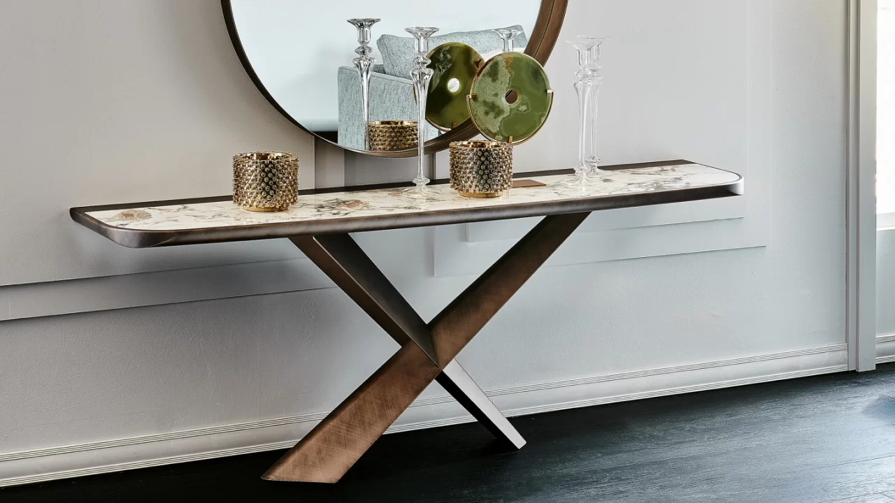 Luxury entryway console table with decorative accents and mirror in modern foyer.