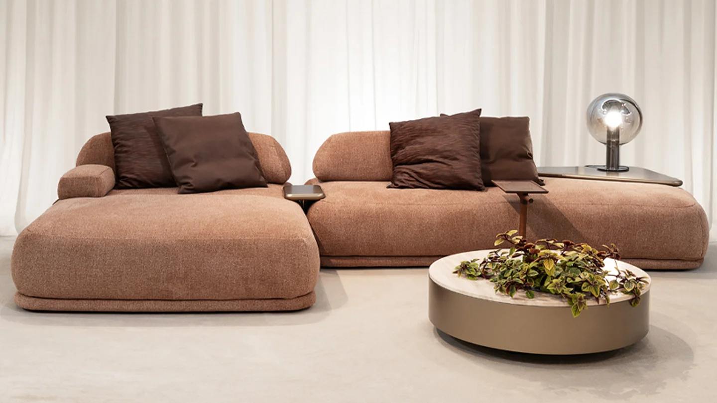 Modern designer furniture in a stylish living room with modular sofas and premium furniture design.